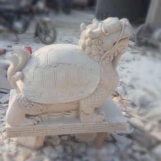 晚霞紅風(fēng)水龍龜石雕是怎么制作出來的？