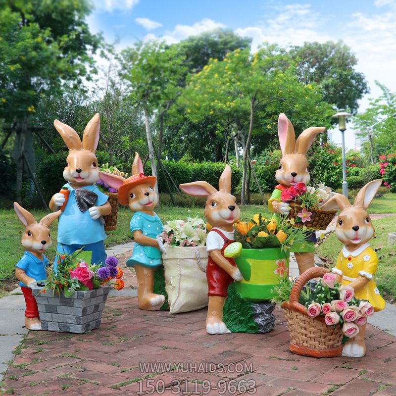 戶外草坪樹脂彩繪一群抱著花盆的兔子雕塑