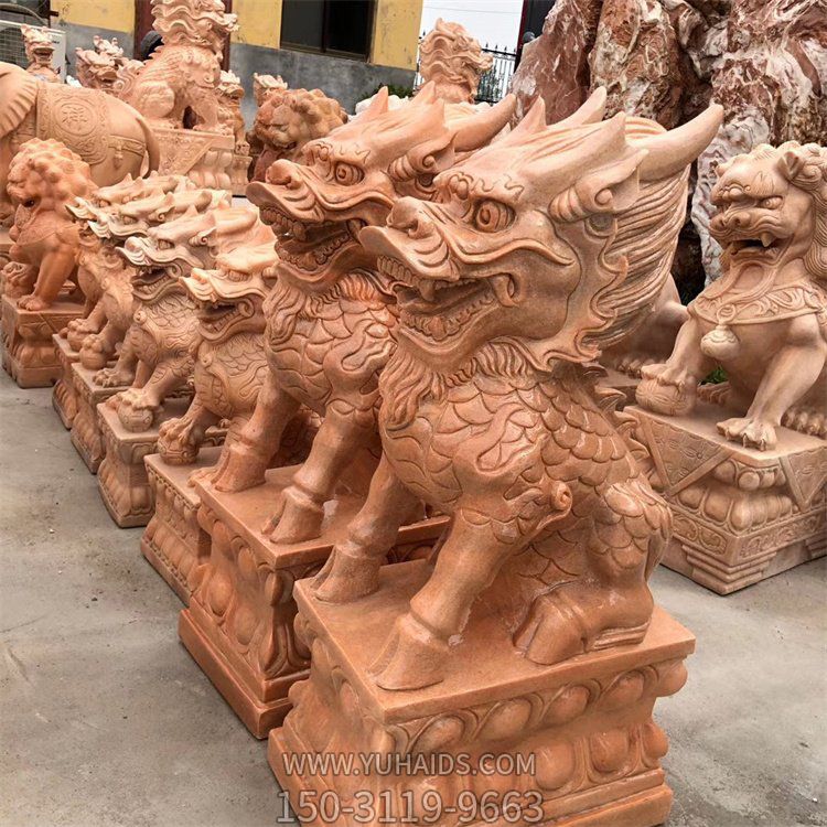 企業大門口擺放晚霞紅雕刻麒麟門墩雕塑