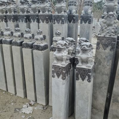 庭院門口擺放青石雕刻仿古抱鼓石