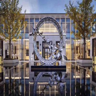 酒店會所水池?cái)[放不銹鋼鏤空圓環(huán)飛翔景觀雕塑